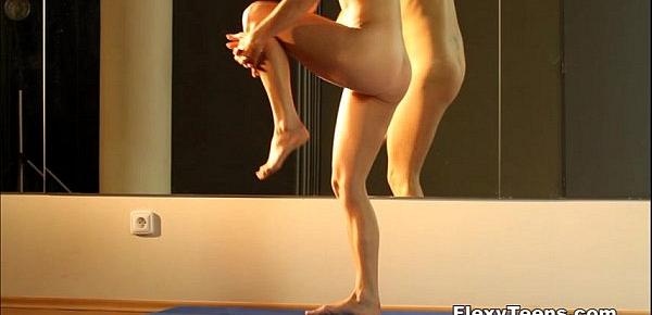  Sporty babe shows nude gymnastics